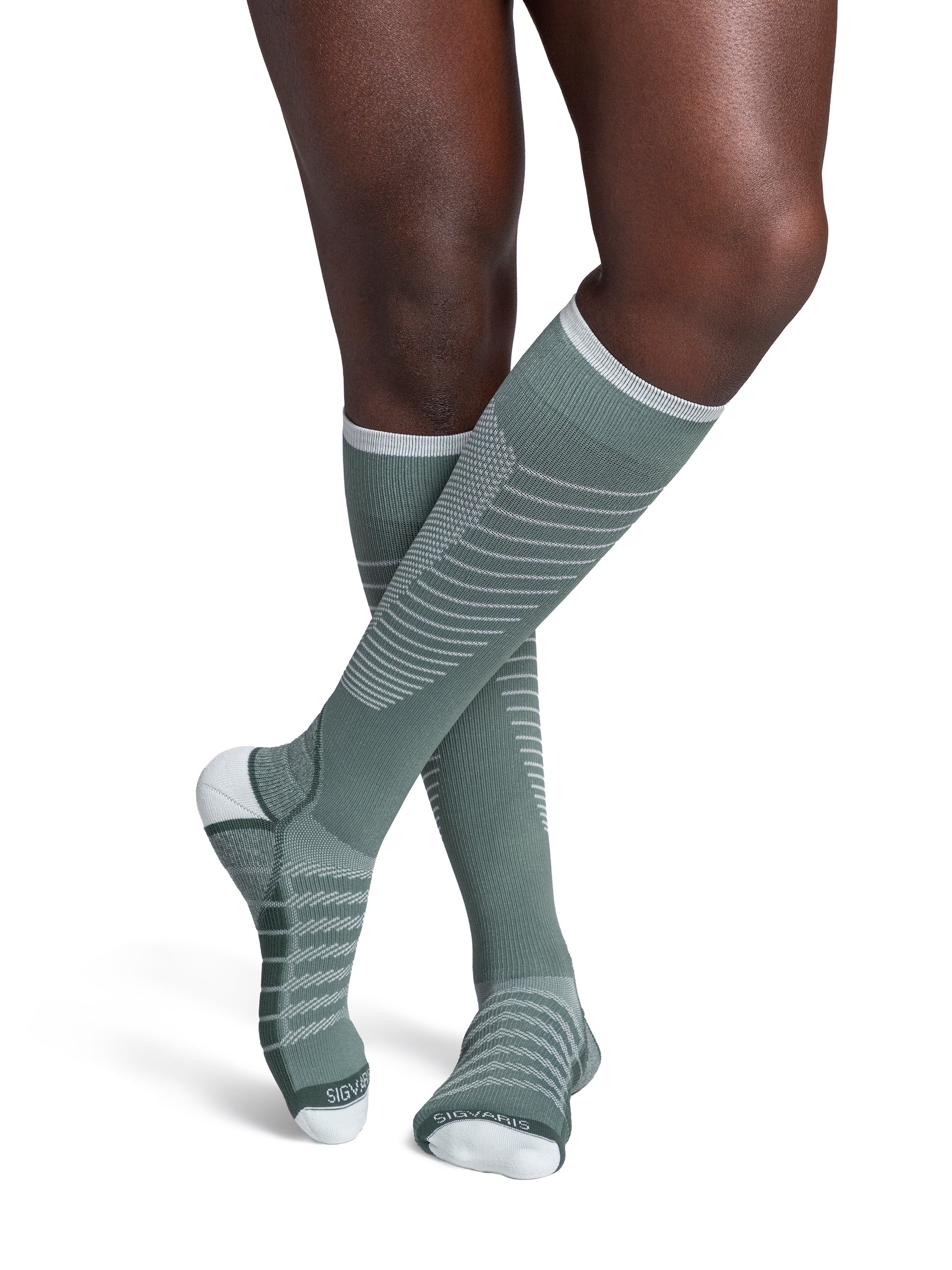 Man wearing Sigvaris Motion Flow Tech compression socks 