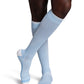 Man wearing Sigvaris Motion Flow Tech compression socks 