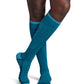 Man wearing Sigvaris Motion Flow Tech compression socks 