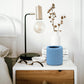 The Sigvaris Doff N' Donner sitting on a bedside table