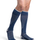 Man wearing Sigvaris Men's Motion Flow Tech compression socks in the color Deep Sea