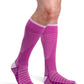 Man wearing Sigvaris Motion Flow Tech compression socks in the color Orchid