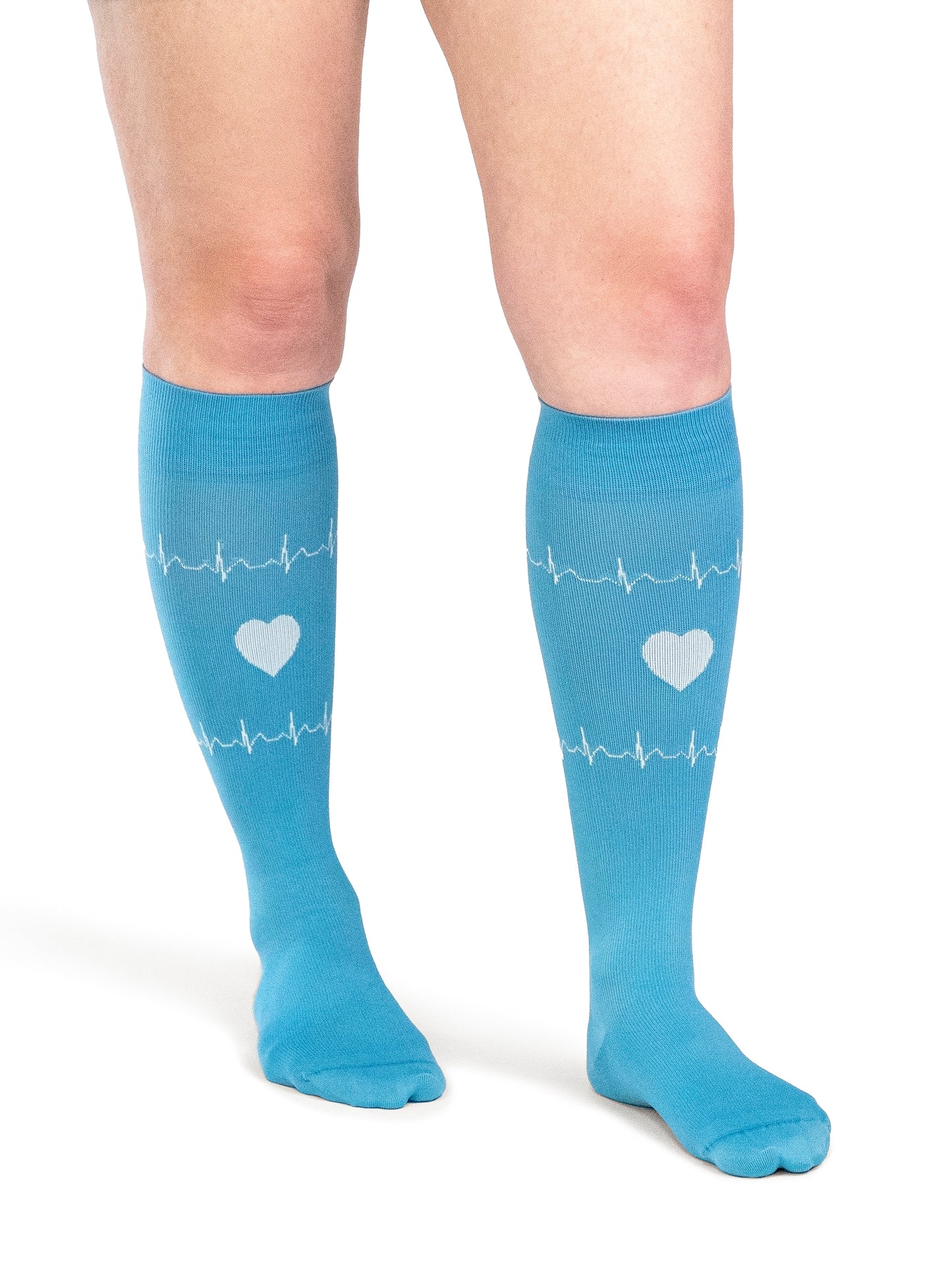 Woman wearing Sigvaris Well-being Microfiber Shades compression socks in the color Nurse Blue