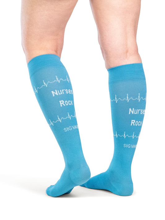 Back view of a woman wearing Sigvaris Well-being Microfiber Shades compression socks in the color Nurse Blue