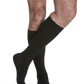 Man wearing All-Season Merino Wool compression socks in the color Black