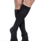 Man wearing Essential Cotton compression socks in the color Black