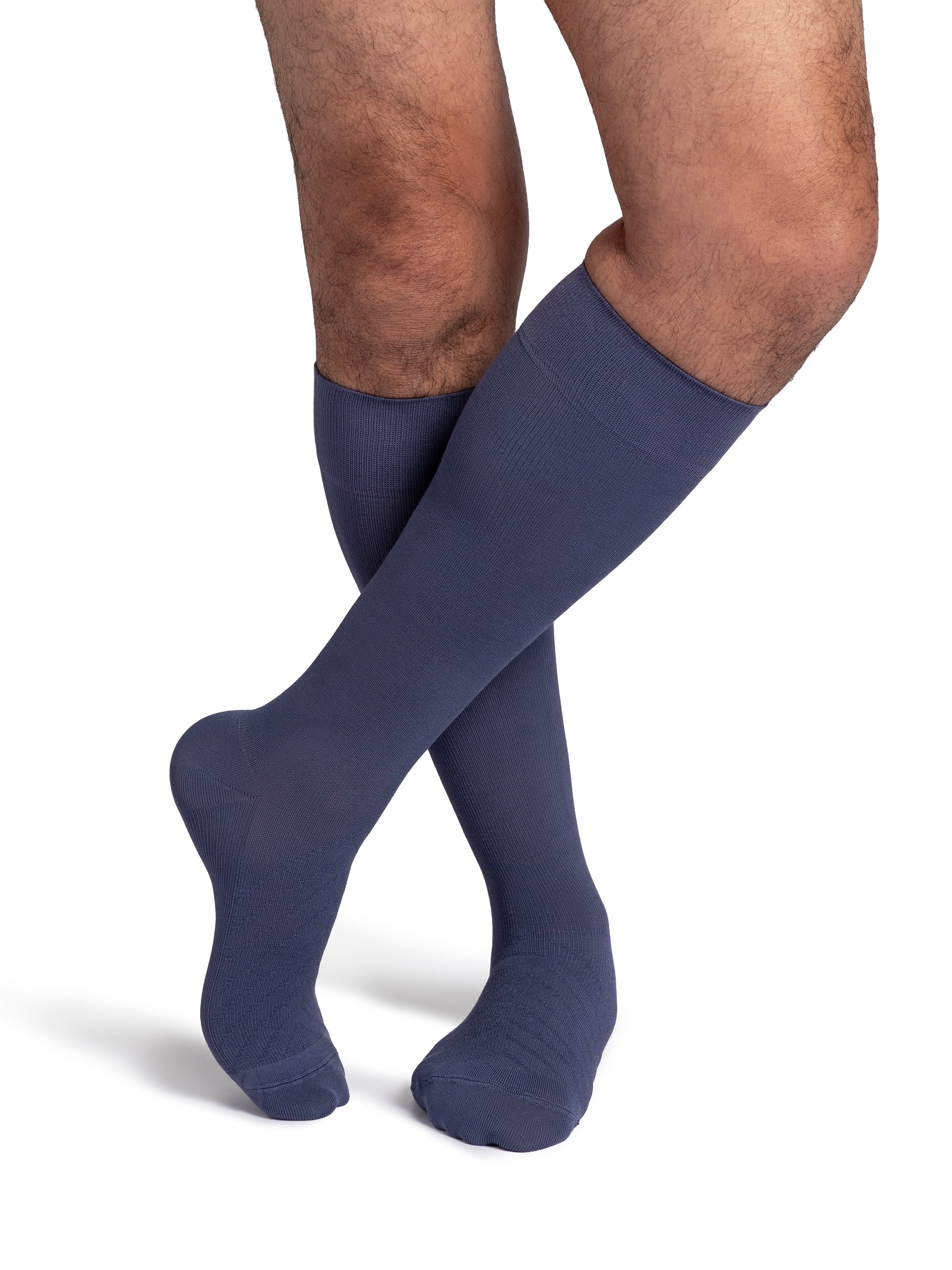 Man wearing Sigvaris Style Bamboo compression socks in the color Dusk Violet