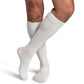 Man wearing Sigvaris Style Bamboo compression socks in the color Ivory