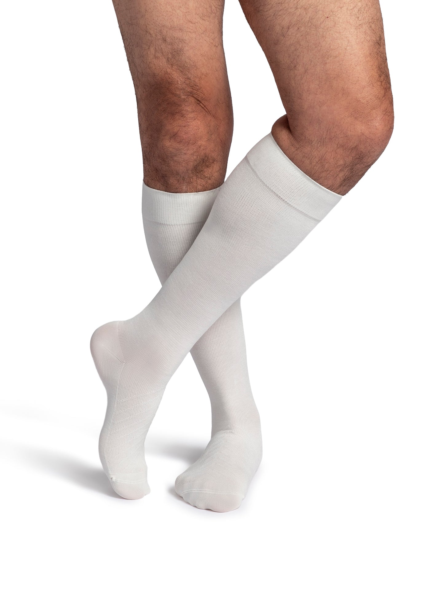 Man wearing Sigvaris Style Bamboo compression socks in the color Ivory