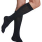 Woman wearing Sigvaris Style Sea Island Cotton compression socks in the color Navy
