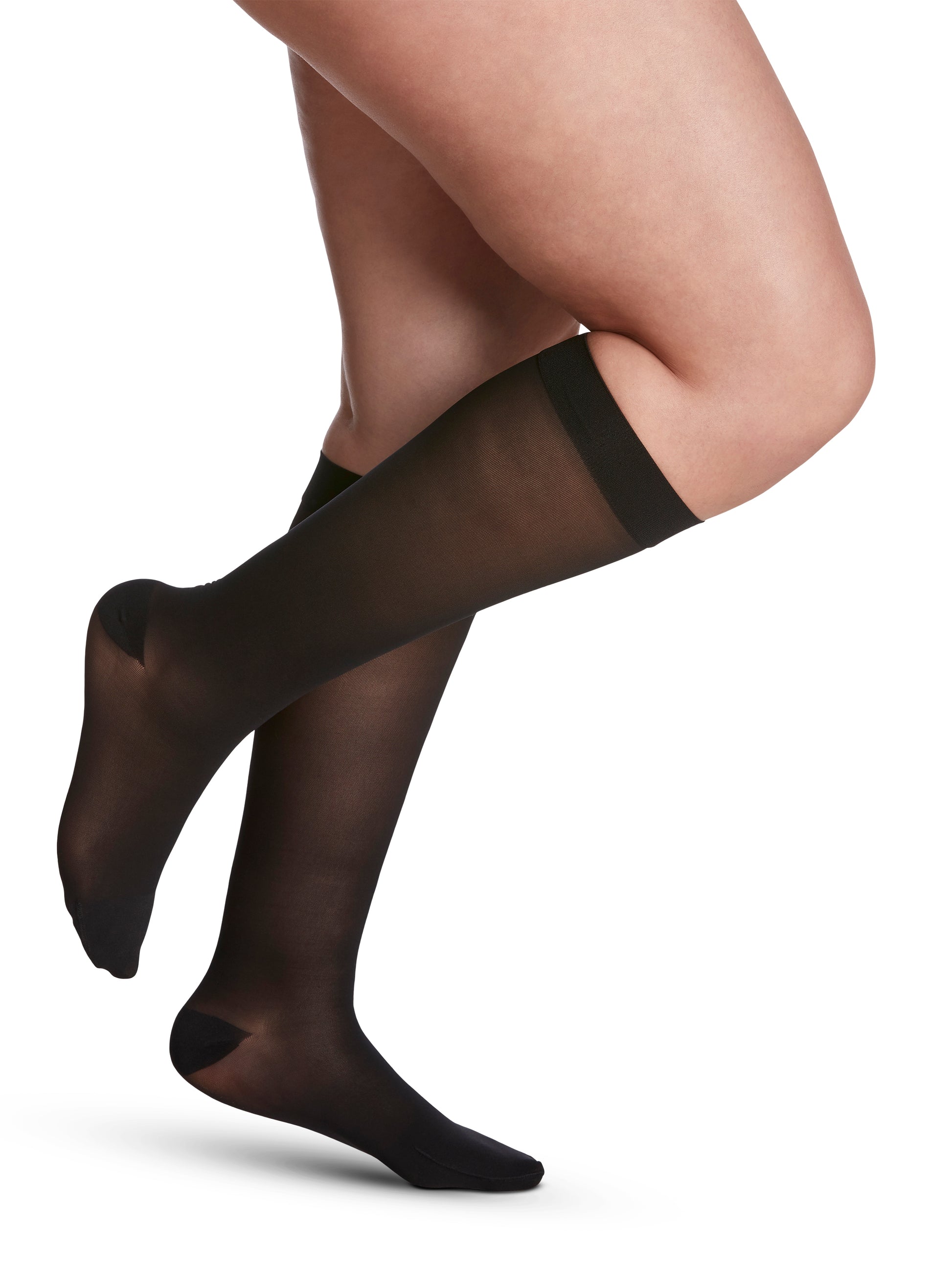 Woman wearing Style Sheer compression knee-highs in the color Black