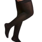 Woman wearing Sigvaris Women's Essential Opaque compression thigh-highs in the color Black