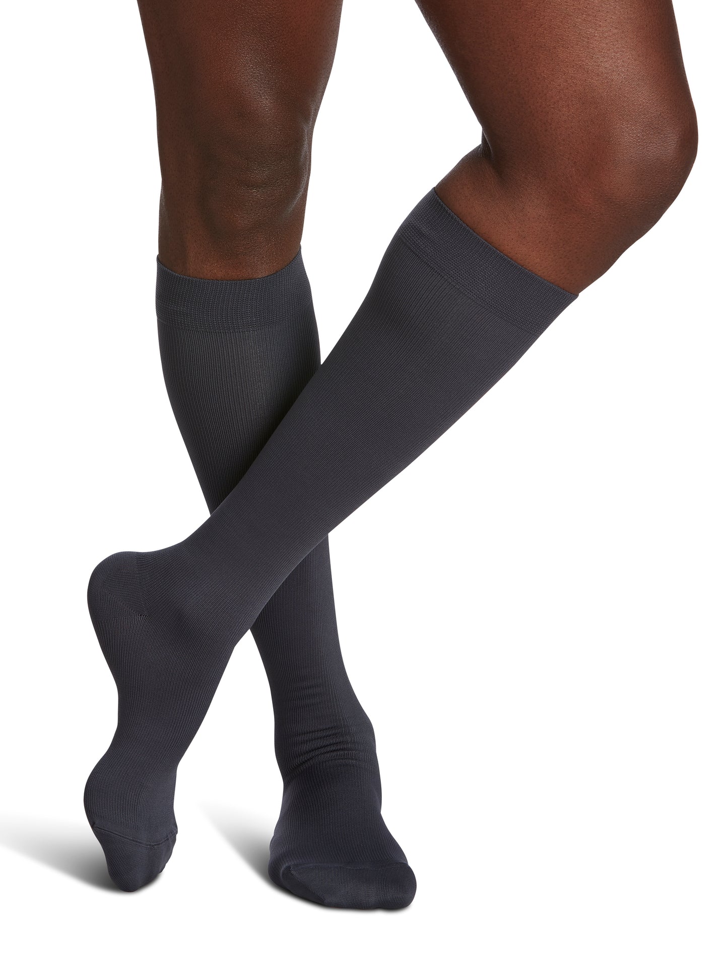 Man wearing Sigvaris Style Microfiber compression socks in the color Steel Grey