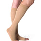 Man wearing Sigvaris Men's Essential Opaque open-toe compression socks in the color Light Beige