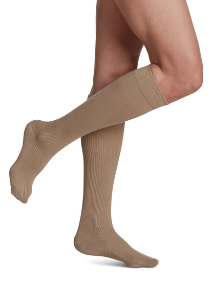Woman wearing Sigvaris Women's Casual Cotton compression socks in the color Khaki
